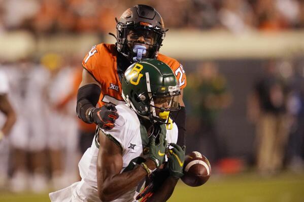 Warren helps No. 19 Oklahoma St. beat No. 21 Baylor 24 14 AP News